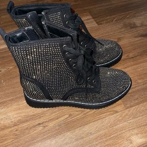 Selling these rhinestone combat boots. They are brand new.